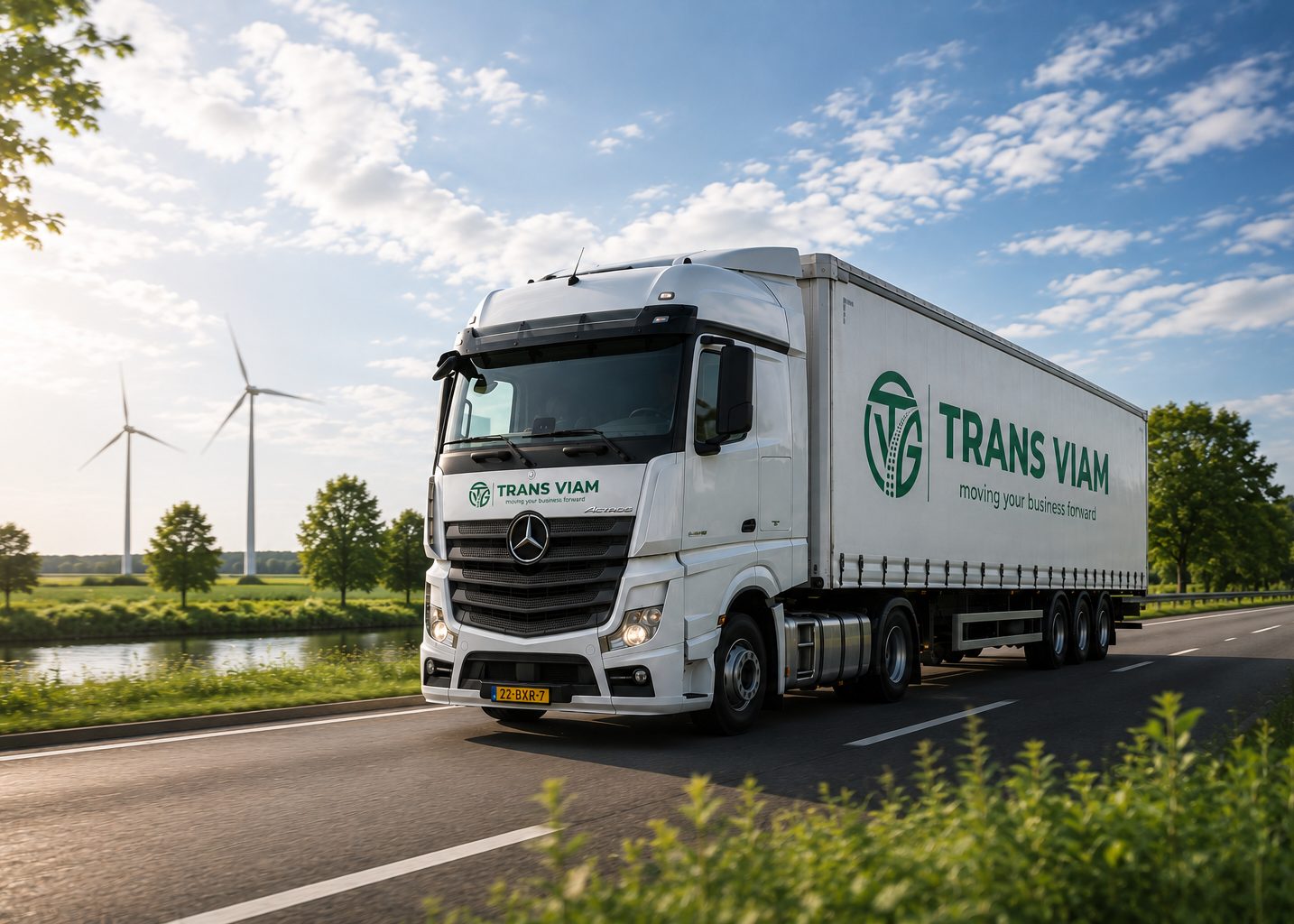 Trekker met oplegger van Trans Viam bij een bord over duurzaam transport